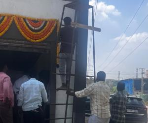 అధికారుల కళ్లముందే అక్రమ షెడ్డు ప్రారంభం